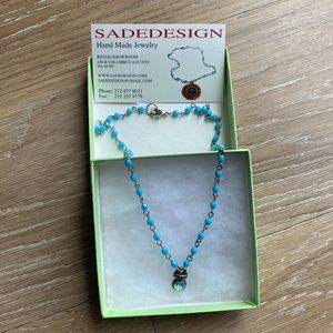 Sade Design light blue beaded necklace